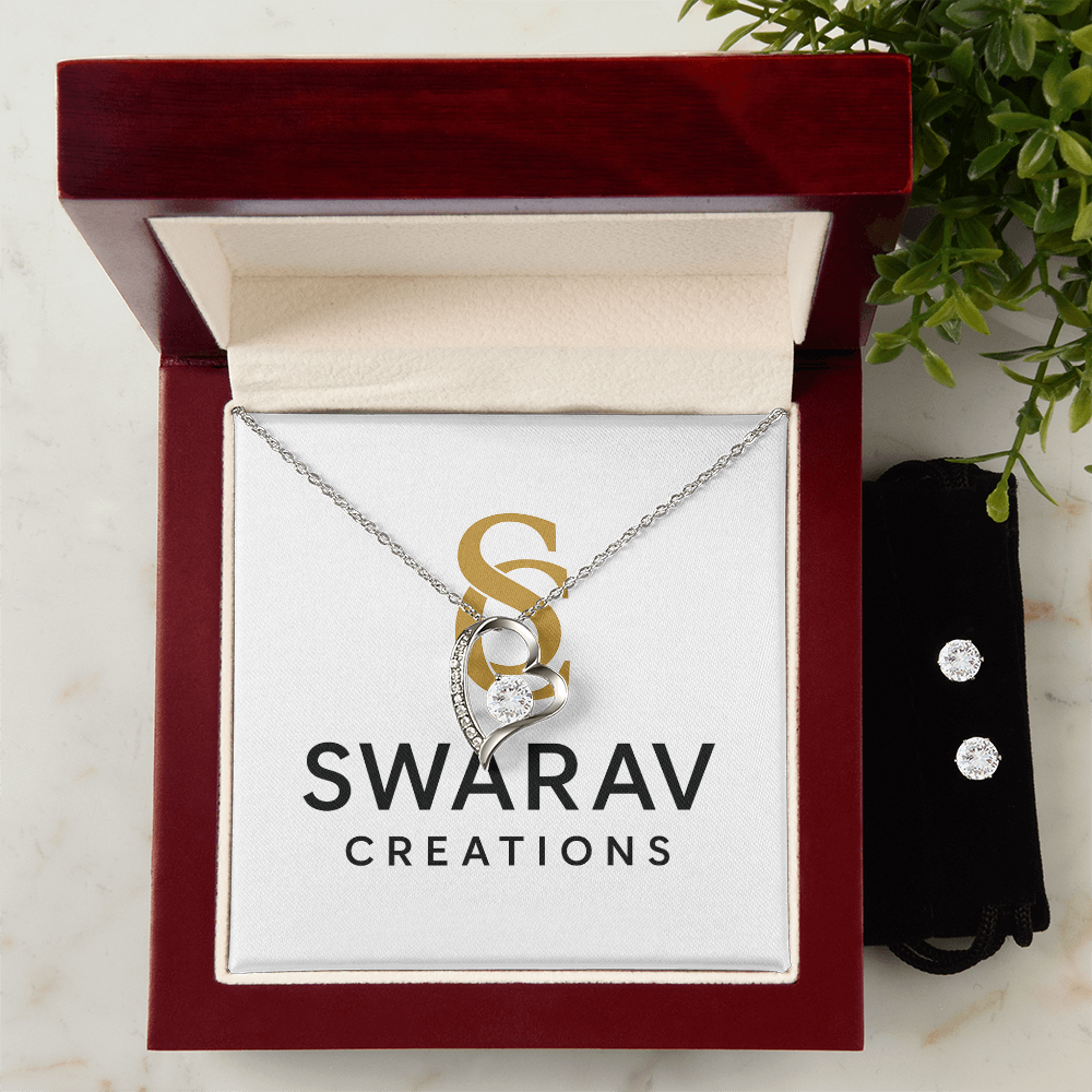 Forever love necklace and earring set in 14k white gold displayed in an open luxury gift box