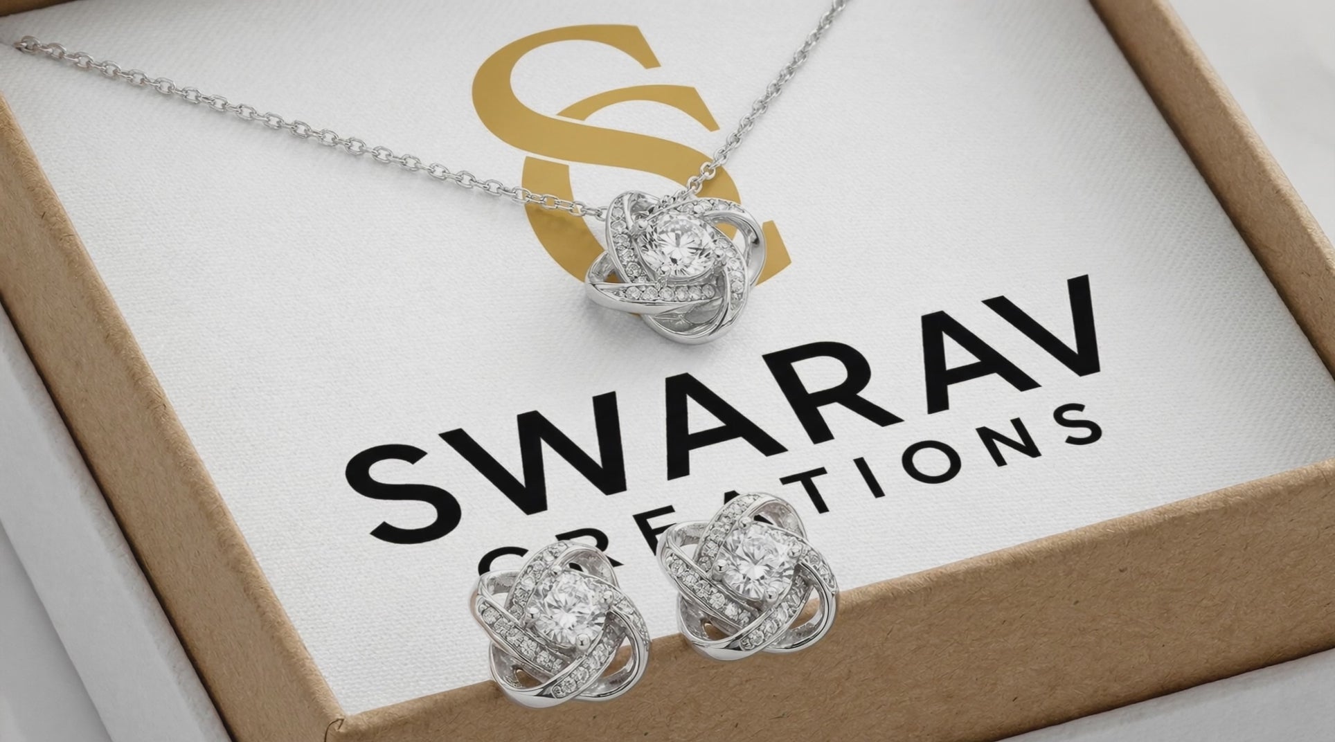 Love Knot Necklace & Earring Set – 14K White Gold packed in Standard Box  with Swarav Creations label printed in background